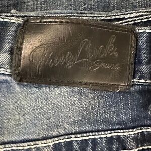 Blue Jeans with Black Leather Patch